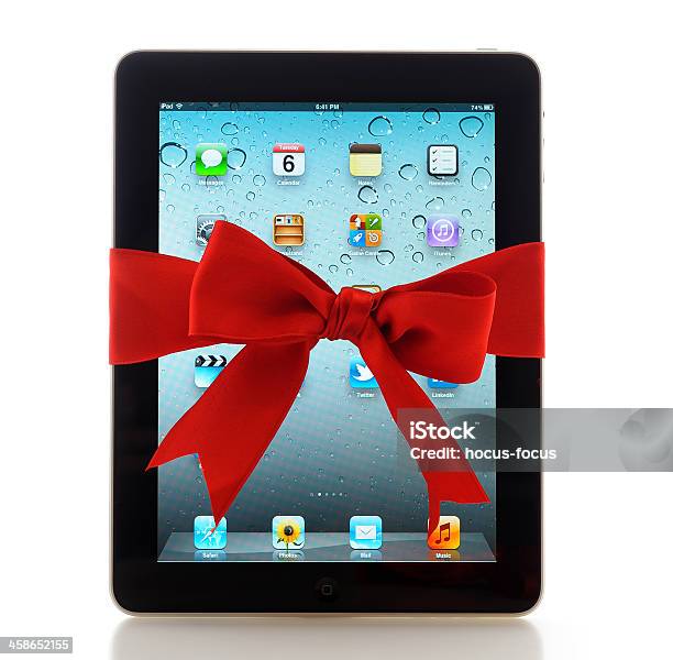 Ipad With Red Ribbon Stock Photo - Download Image Now - Digital Tablet, Gift, iPad
