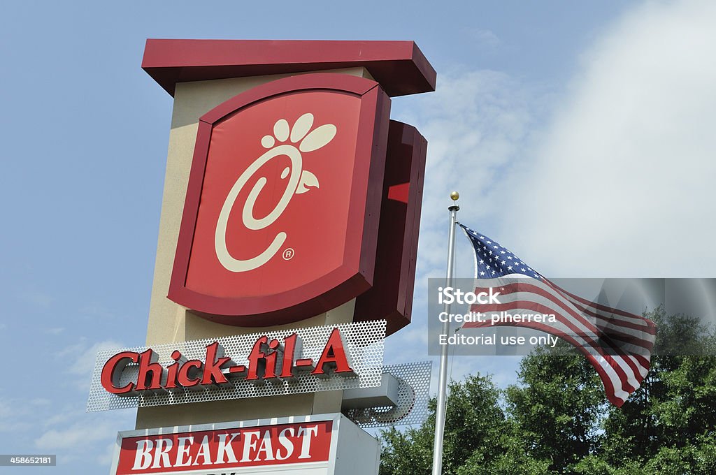Chick-fil-A Logo Sign Little Rock, AR, USA - June 5, 2012: Chick-fil-A is a quick service restaurant specializing in chicken entr&eacute;es.  It is headquartered in College Park, Georgia, a suburb Atlanta. Chick-Fil-A Stock Photo