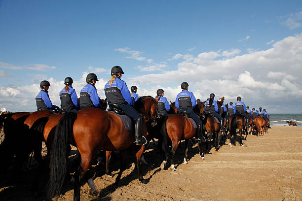 police at the beach - prinsjesdag stockfoto's en -beelden