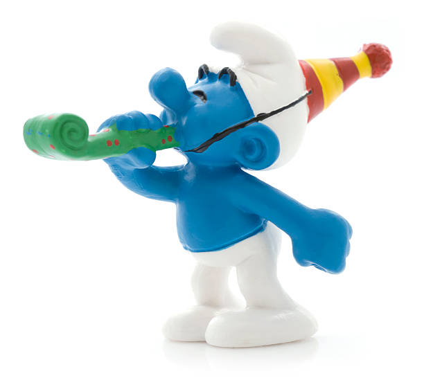 Smurf with party horn stock photo