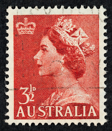 Exeter, United Kingdom - February 17, 2010: A Scottish Used Postage Stamp showing Portrait of Queen Elizabeth 2nd and scottish thistle emblem, printed and issued from 1958 to 1970