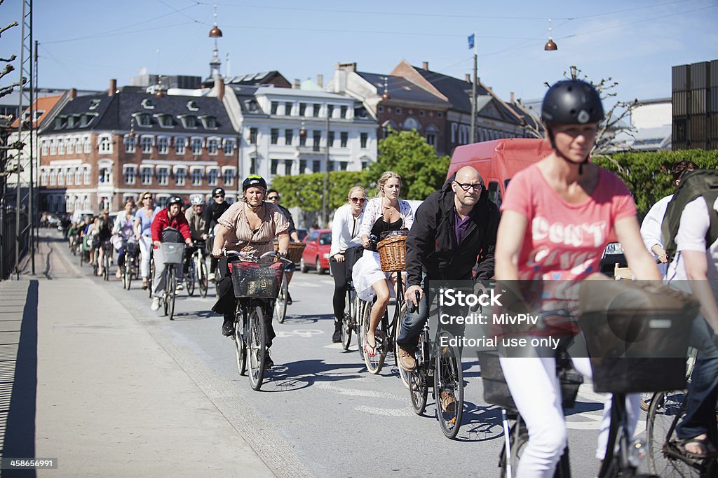 Rush hour in Copenhagen Copenhagen, Denmark - May 9, 2011: Commuters biking at rush hour on B&amp;amp;amp;amp;amp;amp;amp;oslash;rsbroen in Copenhagen where 36% of all citizens commute to work by bicycle. Bicycle Stock Photo