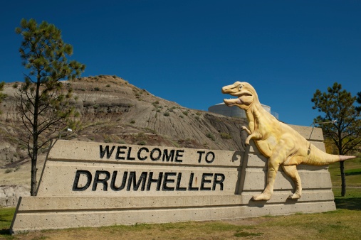 Drumheller, Canada - August 23, 2011: Welcome Monument close of road to Drumheller - famous city with archaeological excavations and Royal Tyrrell Museum of Palaeontologya.