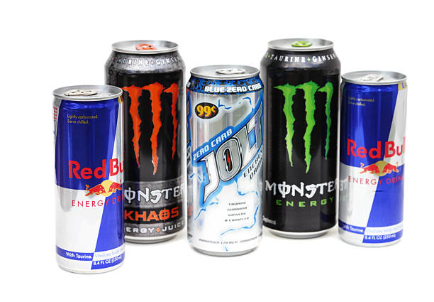 Group of energy drinks including Red Bull West Palm Beach, USA - March 16, 2011: A product shot of three brands of energy drinks: Red Bull, Monster and Jolt. These energy drinks are caffeinated beverages supplemented with vitamins that purport to enhance performance and increase concentration. monster energy stock pictures, royalty-free photos & images