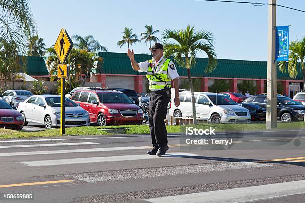 Directing Traffic Stock Photo - Download Image Now - Traffic Warden, Traffic Cop, Car