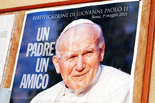 Pope John Paul II on poster Borgosesia, Italy - July 6, 2011:Pope John Paul II  (Pontificate from 16 October 1978 to 2 April 2005) on a poster outside an Italian church in Borgosesia. pope john paul ii stock pictures, royalty-free photos & images