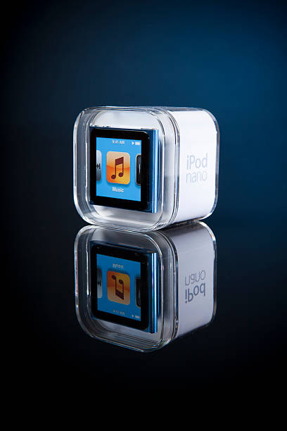 6th Generation Apple iPod Nano Portland, Oregon, USA - October 10, 2011: 6th Generation Apple iPod Nano with Multi-Touch technology shown in blue. Shown here in its original packaging. Apple is known for having exceptionally well designed packaging along with cutting edge products. ipod nano stock pictures, royalty-free photos & images