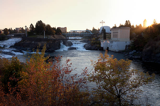 Historic Water Power Plant - Spokane "Spokane, Washington, United States - October 10th, 2012: Historic Hydro Electric facilitiy built in 1922 over the upper Spokane Falls. is one of the tourist attraction at River park on the Spokane River." spokane river stock pictures, royalty-free photos & images