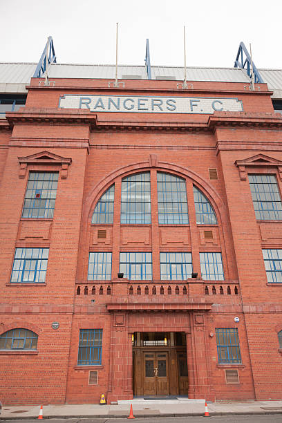 Ibrox Stadium, Glasgow Glasgow, UK - July 12, 2011: The Rangers F.C. sign over the entrance to the Bill Struth Main Stand at Ibrox Stadium, Glasgow, the home ground of Rangers Football Club. The main stand was built in 1928 with an impressive red brick facade. ibrox stock pictures, royalty-free photos & images