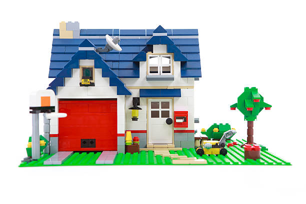 Lego house Merano, Italy - July 29th, 2011: builded lego house on white background. Lego is a line of construction toys manufactured by the Lego Group, a privately held company based in Billund, Denmark. The company\'s flagship product, Lego, consists of colorful interlocking plastic bricks. lego stock pictures, royalty-free photos & images