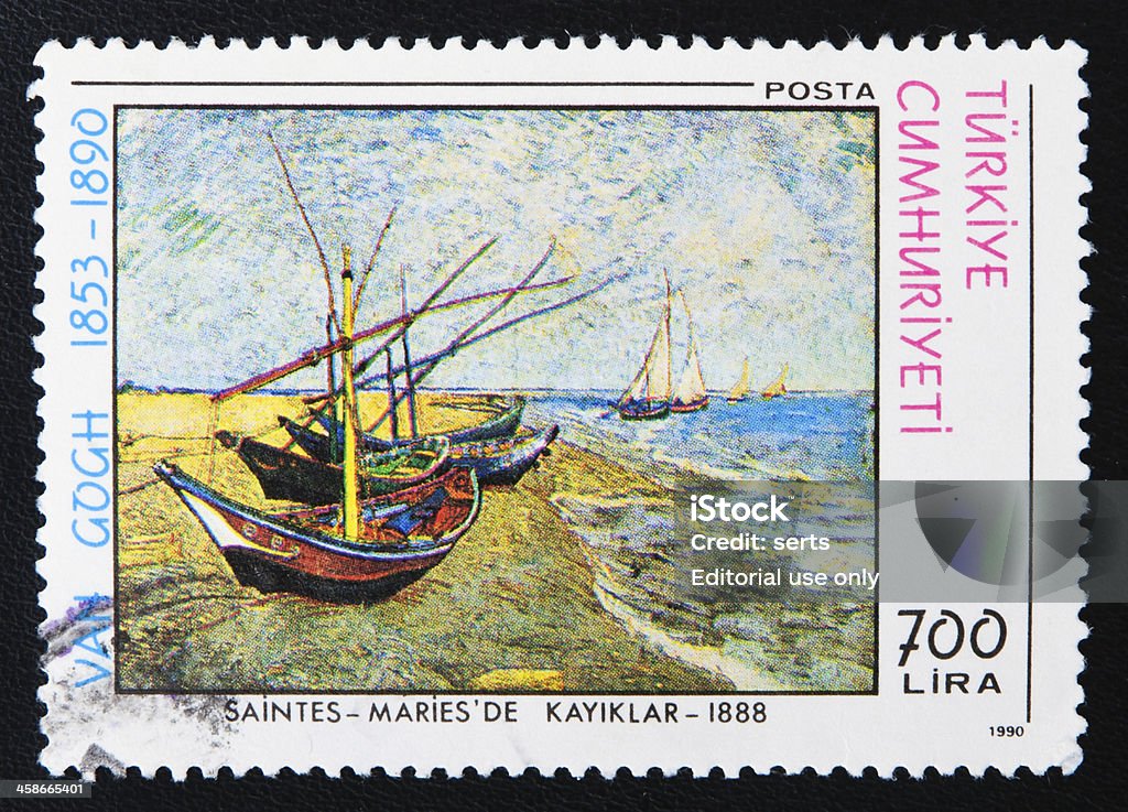 Postage Stamp Fishing Boats on the Beach at Saintes-Maries Istanbul, Turkey - November 18, 2011: Close-up of a Turkish stamp showing an image of the Fishing Boats on the Beach at Saintes-Maries painting by the Dutch post-Impressionist painter Vincent Willem Van Gogh. Vincent Van Gogh - Painter Stock Photo