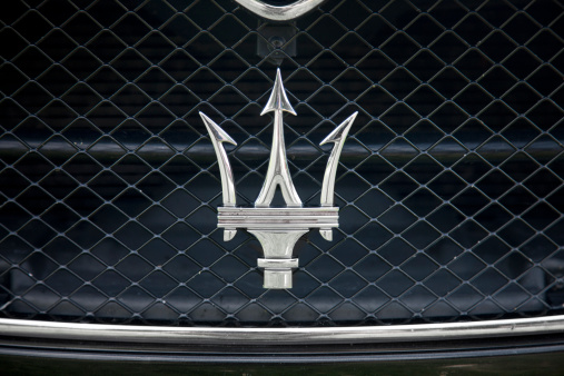 Nashville, Tennessee, USA - April, 29th 2012: A Maserati luxury sports car's classic trident logo on the front grill of a sports sedan.