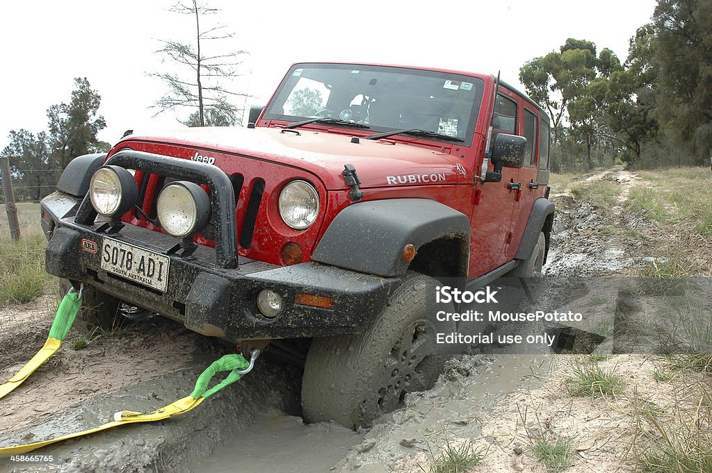 Red 2007 Jeep Jk Wrangler Rubicon Stuck Mud Border Track Stock Photo -  Download Image Now - iStock