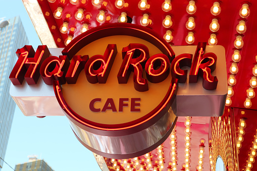 Las Vegas, Nevada, United States - June 03, 2011: This Hard Rock Cafe neon sign is on a Las Vegas Boulevard South, the other side of The Monte Carlo. The Hard Rock Cafe is a chain of rock and roll themed restaurants for fans of music, food, and great times.