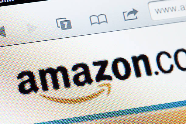 Amazon logo Erandio, Spain - March 8, 2011: Amazon.com Inc. logo as seen on an LCD screen with facebook front page opened in Safari web browser. Amazon is one of the most famous online shop in the internet. amazon river stock pictures, royalty-free photos & images