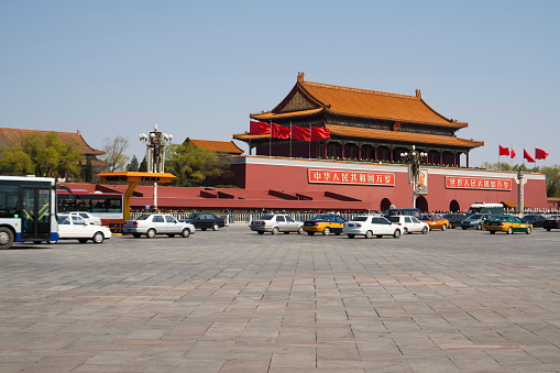 Beijing, China - March 30, 2008: Cars are running in the Chang An Avenue in front of the famous Tiananmen Gate of Heavenly Peace, which is one of the most important architectures in Beijing ,the capital of China.