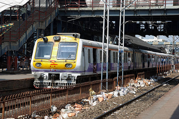 Mumbai, India - November, 5 2010: Exterior of railway carriage on local Mumbai train showing train on Bandra West railway station