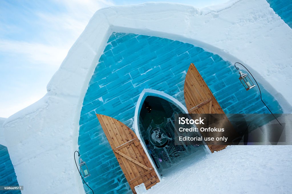 Quebec City Ice Hotel Ice Wall and Entrance QUEBEC, CANADA - January 30, 2011: An ice hotel is a temporary hotel made up of snow, sculpted blocks of ice, and some steel framing. Quebec city Ice hotel is located just 10 minutes from downtown Quebec City in one of the most beautiful natural parks in the area. Canada Stock Photo