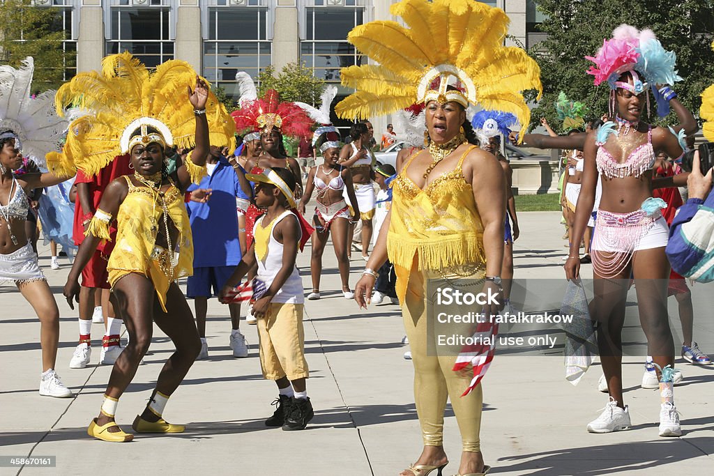 Jamaica Festival and Parade in Chicago Chicago, USA - September 17, 2005: Jamaica Festival and Parade in Chicago. Chicago ethnic group - Jamaican celebrate their holidays parading in downtown Chicago (Millennium Park) dancing dressed in traditional colorful costumes Music Festival Stock Photo