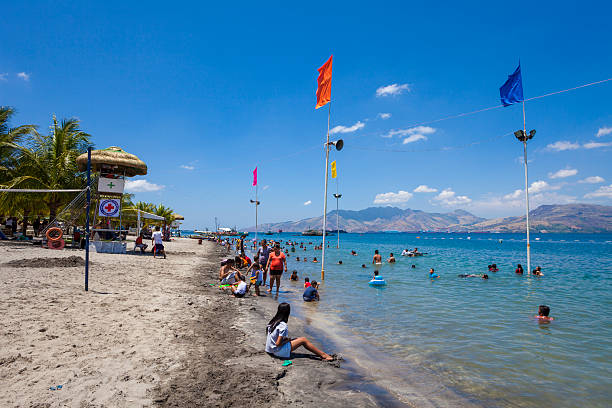 Subic, Philippines: Crowded beach over Easter Subic, Philippines - April 7, 2012: Crowded beach at Subic bay over the Easter Long weekend. Many people can be seen relaxing and playing at the beach zambales province stock pictures, royalty-free photos & images