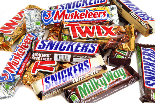 West Palm Beach, USA - May 6, 2011: A product shot of an assortment of different Mars Inc candy bars: Snickers, Milky Way, Twix, Snickers Almond and 3 Musketeers.