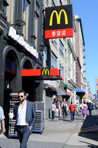 NEW YORK, UNITED STATES - June 3, 2011: McDonald's in Chinatown caters to Chinese reading customers.