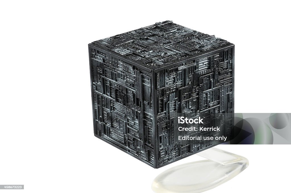 Star Trek - Borg Cube  -Model from Micro Machines Gera, Germany - August 5, 2011: Borg Cube - Star Ship model from Micro Machines. Part of a series from about 1995. Star Trek is a famous TV Series from Gene Roddenberry. Science Fiction - plays in the future. The Borg a one of the enemys in the Star Trek Universe. Cube Shape Stock Photo
