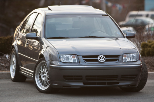 Dartmouth, Nova Scotia, Canada - March 21, 2006: A Mk4 Volkswagen Jetta sedan with custom wheels.  Production of the fourth generation Jetta began in July 1999.  Carrying on the wind nomenclature, the car was known as the Volkswagen Bora in much of the world.