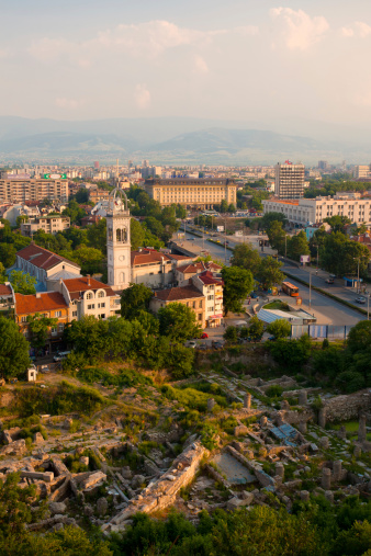 Plovdiv, Bulgaria - June 1, 2011: Vertically orientated high-angle view over Plovdiv in Bulgaria in the afternoon light. roman era ruins can be seen in the foreground of the image.