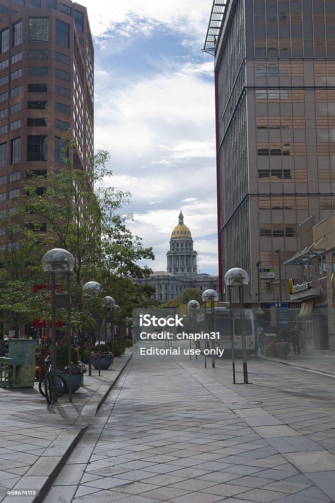 Colorado Capitol and Denver Downton Plaza Denver, United States - September 17, 2011: Colorado Capitol and Denver Downton Plaza - The gold domed capitol building of Colorado sits at the end of the popular 16th Street Mall in Denver, Colorado on a quiet Saturday morning. Architectural Dome Stock Photo