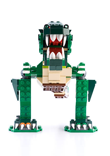 LEGO Dinosaurus "Ankara, Turkey - April 04, 2012: The new LEGO Creator Ferocious Creatures kit lets little creatures (those would be your kids) build three terrifying animals. One day it's a dinosaur and the next, a crocodile. It can even become a deep-sea fish! The tail is designed to move gracefully back and forthaajust like the real thing!" coelurosauria stock pictures, royalty-free photos & images