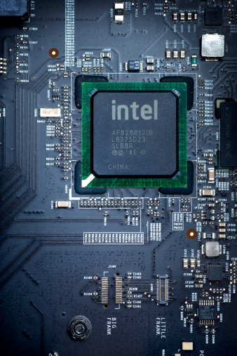 San Diego, California, United States - March 9th 2011: This is a close up overhead photo of an intel chip inside of a Mac Pro tower. The processor is a 2 x 2.26 Ghz Quad-Core Intel Xeon.