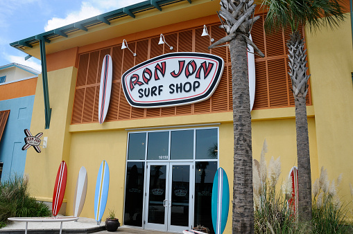 Panama City Beach, Florida, USA - August 6, 2011: The Panama City Beach, Florida location of Ron Jon Surf Shop is observed on a beautiful, blue sky day. Founded in 1961 Ron Jon\'s has grown yearly and includes the flagship store in Cocoa Beach, Florida which is open 24 hours a day, 365 days a year.