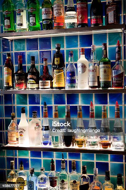 Liquor Bottles Bar Stock Photo - Download Image Now - Absolut, Vodka, Addiction