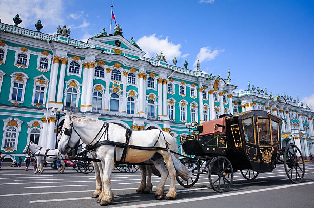 Traveling to Russia "Saint-Petersburg, Russia - July 21, 2009: Summer day. The carriage pulled by horses near the State Hermitage Museum in the summer day on July 21, 2009 in Saint-Petersburg, Russia" horse cart photos stock pictures, royalty-free photos & images