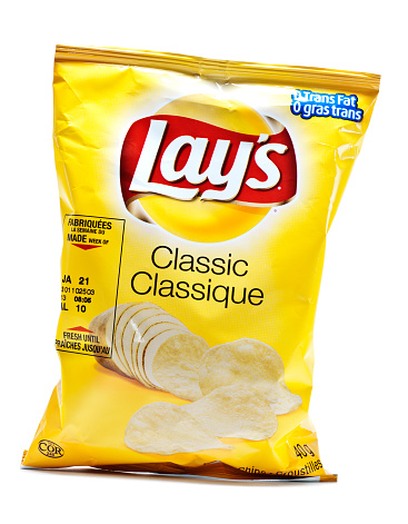 Vancouver, Canada - February, 11 2012: A bag of Lays classic potato chips against white background.