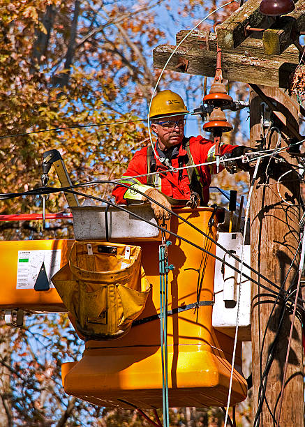 Hydro Quebec Lineman Restoring Power in Connecticut after Nor'easter stock photo
