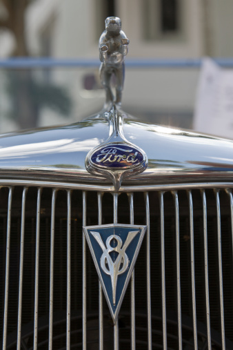 Naples, USA - February 16, 2008: At an outdoor car show in Naples, FL, a close up view of the hood ornament of a classic Ford automobile.