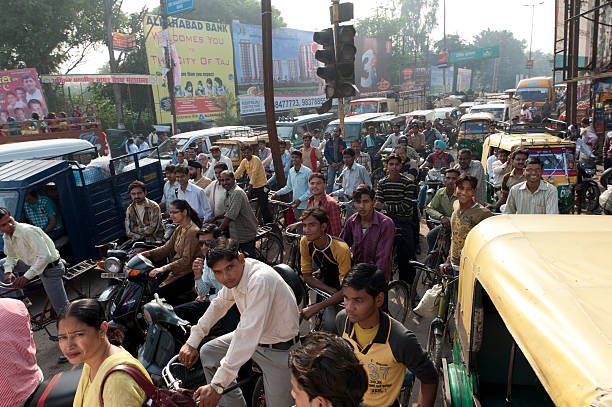 Rajasthan, India - March 14, 2006: Two men riding a motorcycle on a road in the region