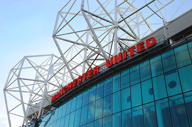 Manchester, England - March 1st, 2011: The east stand of Old Trafford football stadium, home of Manchester United. With space for 75,957 spectators, Old Trafford has the second-largest capacity of any English football stadium after Wembley Stadium.