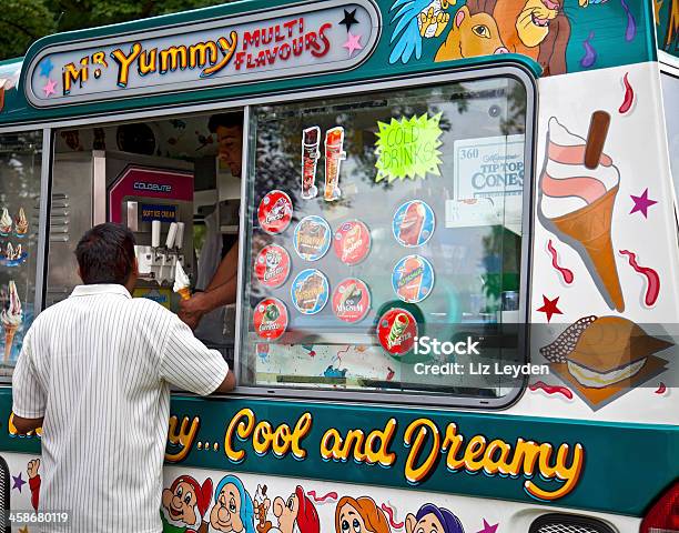 Vendor Selling An Ice Cream Cone From A Van Stock Photo - Download Image Now - Adult, Buying, Cold Temperature