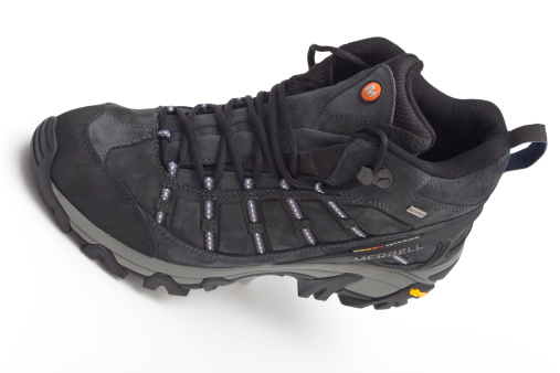 Trebnje, Slovenia, - November 06, 2011: Merrell brand hiking shoes, photographed in the studio on a white background.