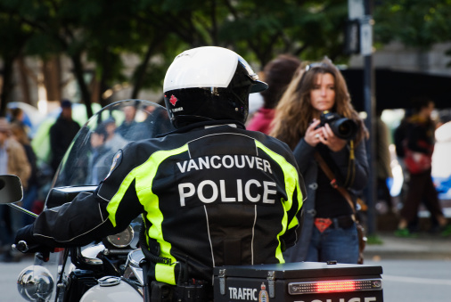 Vancouver, Canada-October 15, 2011: Vancouver Police on motorcycle during the first day of Occupy Vancouver protests.