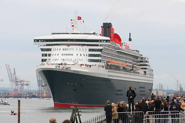 View of the Queen Mary 2 anchored near Teignmouth, Devon, UK.  There are no people in the photograph
