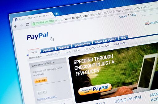 &Oacute;zd, Hungary - September 26, 2011: PayPal start page in browser window with internet address on top. PayPal is an e-commerce business allowing payments and money transfers to be made through the Internet. Online money transfers serve as electronic alternatives to traditional paper methods such as checks and money orders.