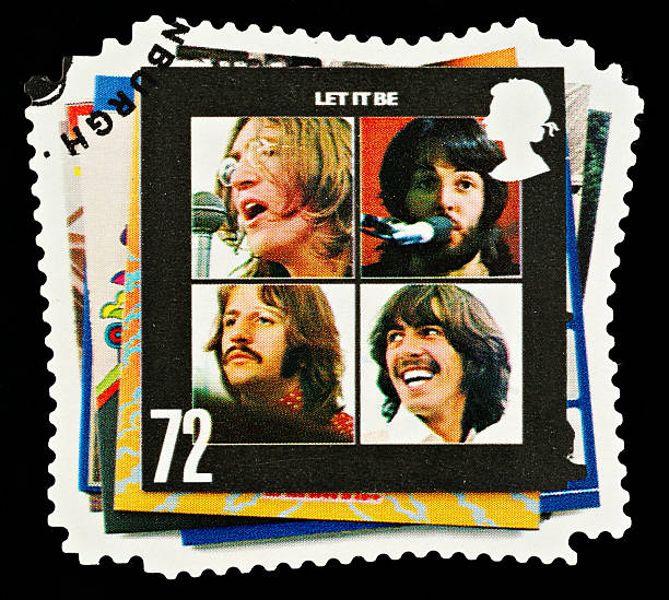 Beatles Pop Group Postage Stamp Exeter, United Kingdom - March 07, 2010: British Postage Stamp showing The Let It Be Album Cover showing the Four Members of the Beatles Pop Group, circa 2007 postmark photos stock pictures, royalty-free photos & images