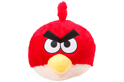 Cantley, Quebec, Canada - November 23, 2011: This is a Red Angry bird fluffy toy. This Angry Bird is part of the video game Angry Birds and is one of the most popular games across all platforms.