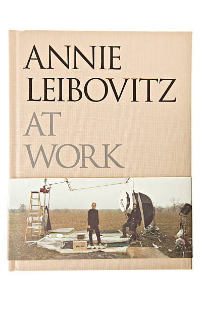 Annie Leibovitz At Work Chico, California, USA - August 06,2011. An overhead close up of a book titled Annie Leibovitz At Work, Annie is a world renowned photographer and she recounts some of her most interesting shoots in the book. fame photos stock pictures, royalty-free photos & images