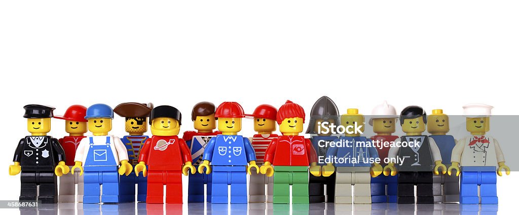 LEGO figures London, United Kingdom- September 22, 2011: A group of lego mini figures  on white background. The lego figure is a small plastic toy available through the Danish toy manufacturer the Lego Group. They were first produced in 1978 People Stock Photo