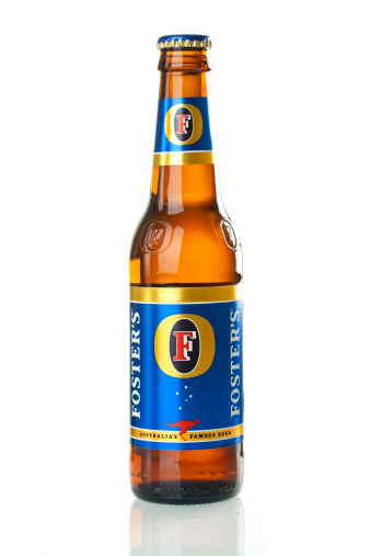 Izmir, Turkey - May 25, 2011: 330ml Foster's beer bottle isolated on white. Foster's is the most famous Australian beer and made by the Carlton United Beverages